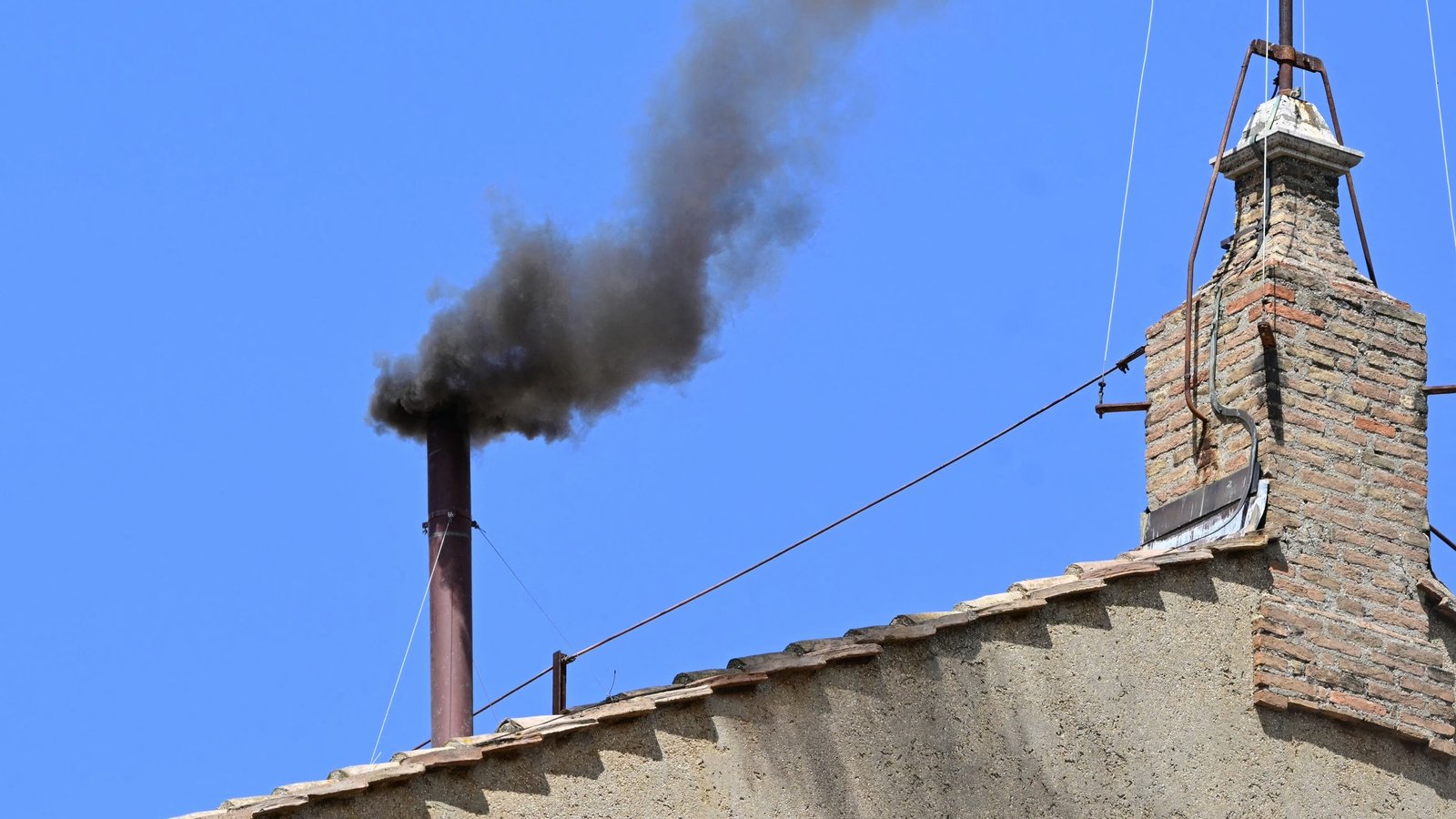 The first smoke of the day was black smoke from the Sistine Chapel, as cardinals failed in their latest attempt to elect a new pope by a two thirds majority