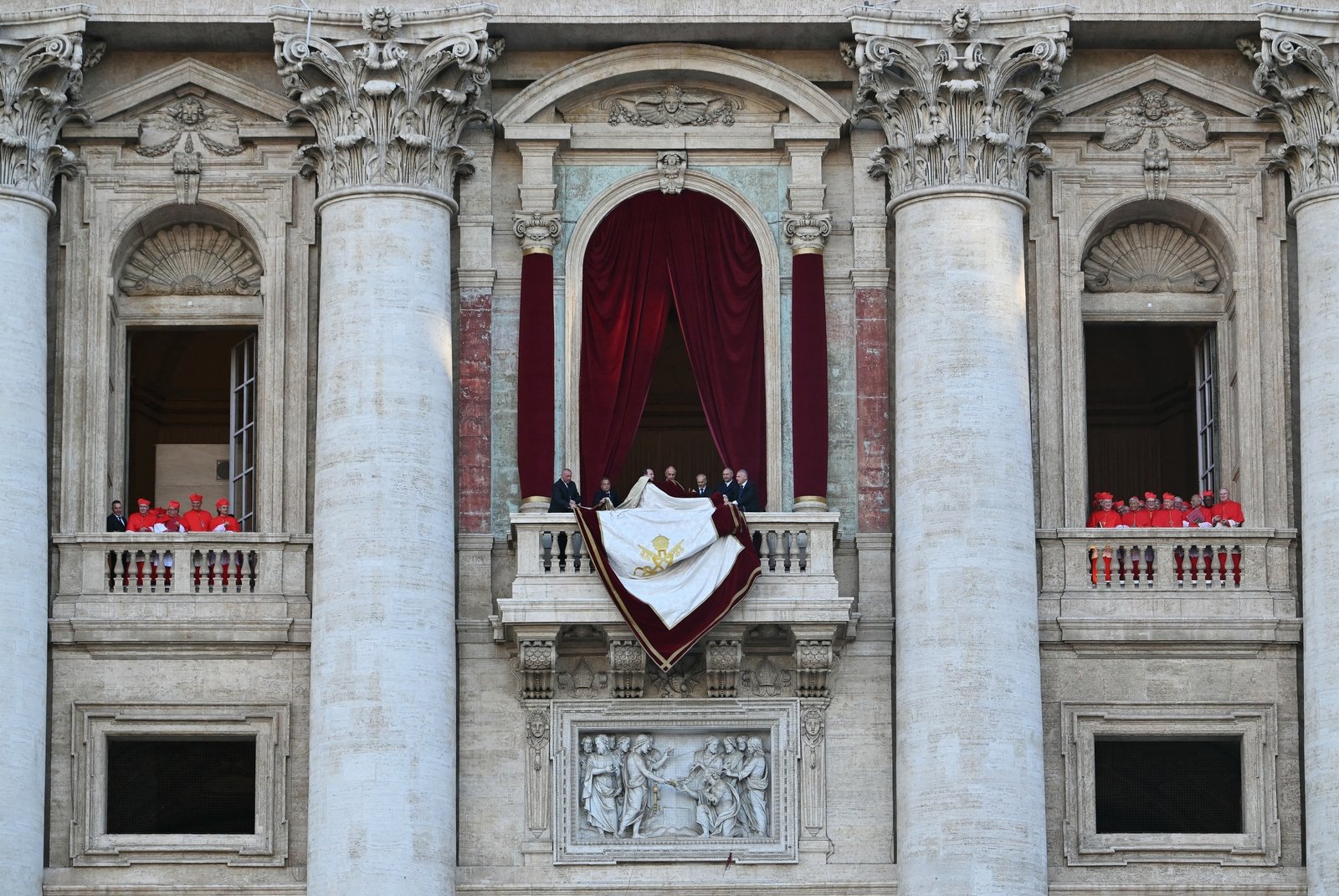 And as the world's media reported on the election, there was much anticipation ahead of the balcony appearance