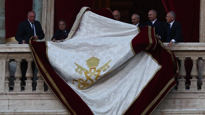 The balcony on the Saint Peter's Basilica is prepared following the election of Pope Leo