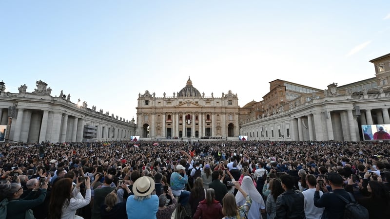 The crowd in St Peter's Square listens to the new Pope's first address