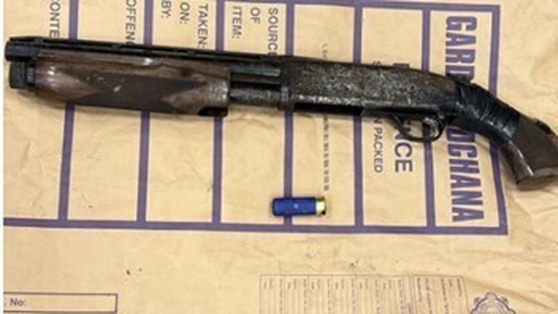 A pump-action shotgun seized by Gardaí following a series of raids in Finglas