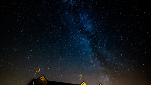 3 shooting stars over the rooftop in front of the milky way, Ramelton, County Donegal. Photo: Getty Images