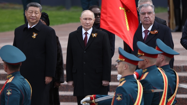 Russian President Vladimir Putin and Chinese President Xi Jinping at a wreath laying ceremony in Moscow
