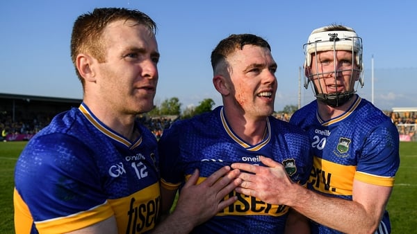 Three Tipperary stalwarts, Noel McGrath, Ronan Maher and Seamus Kennedy, revel in their first championship win in two years