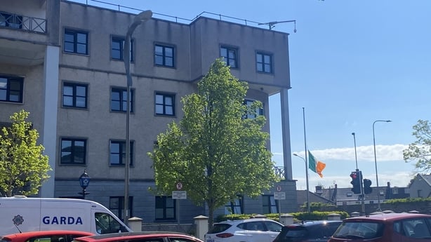 The tricolour is flying at half-mast at Anglesea Street Garda Station