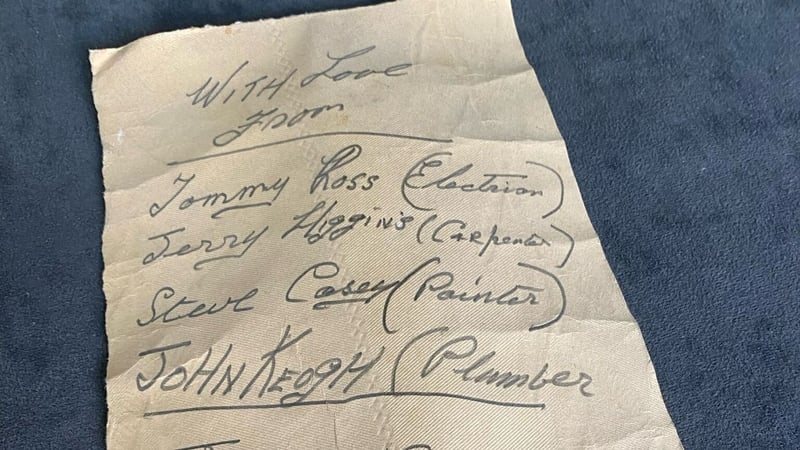 The note, on an old piece of wallpaper, is dated July 1969.