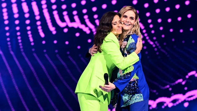 Sandra Studer (L) and Hazel Brugger embraced on stage before the start of the first semi-final.