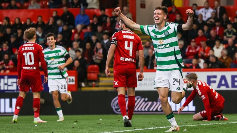 Johnny Kenny celebrates his strike as Celtic eased to victory at Aberdeen