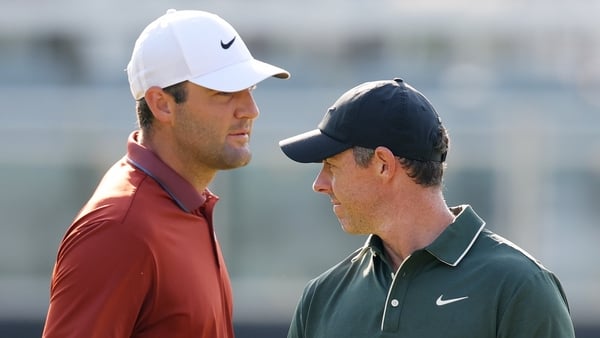 CHARLOTTE, NORTH CAROLINA - MAY 15: Scottie Scheffler of the United States and Rory McIlroy of Northern Ireland look on while playing the 10th hole during the first round of the PGA Championship at Quail Hollow Country Club on May 15, 2025 in Charlotte, N