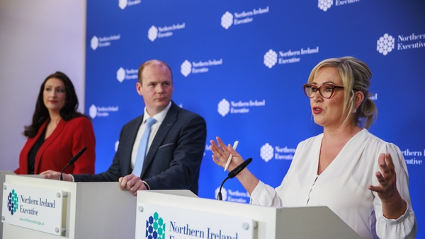 Deputy First Minister Emma Little-Pengelly (L), Communities Minister Gordon Lyons (C) and First Minister Michelle O'Neill (R) launched the anti-poverty strategy