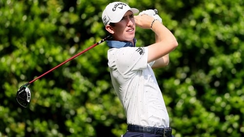 Tom McKibbin hits a tee shot on the 12th hole at Quail Hollow Country Club