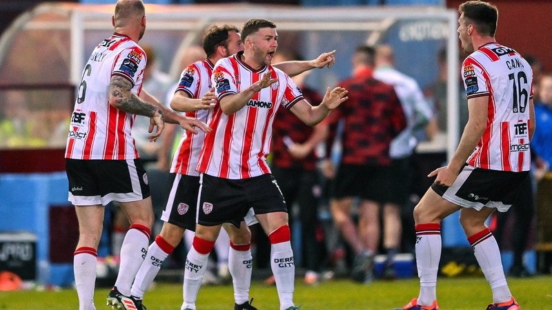 Derry City's Dom Thomas (C) celebrates after scoring the equaliser
