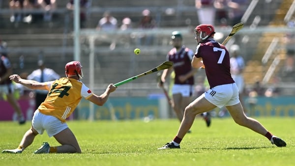 TJ Brennan of Galway (R) in action against Antrim's Eoin O'Neill