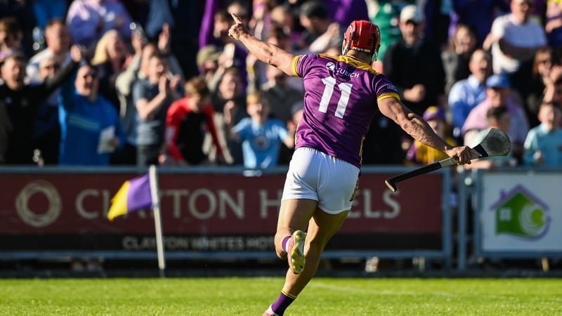 Lee Chin celebrates his winning goal