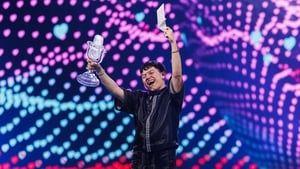 JJ holding the iconic microphone trophy.