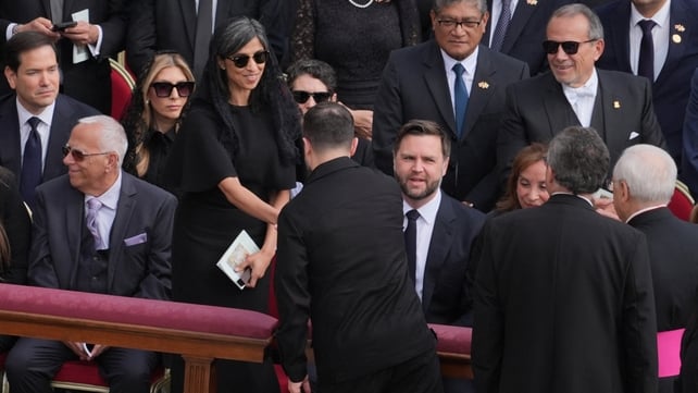 Ukrainian President Volodymyr Zelensky greets US Vice President JD Vance and his wife ahead of the mass