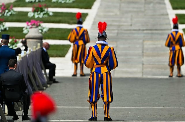 Swiss Guards take up their positions in the square