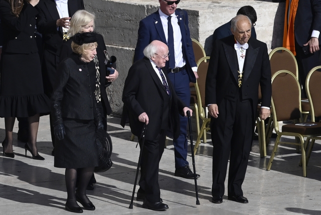 President Michael D Higgins and his wife, Sabina, are shown to their seats in St Peter's Square