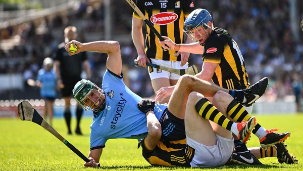 Chris Crummey of Dublin in action against TJ Reid, below, and John Donnelly