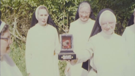 Dominican nuns with a relic of Oliver Plunkett in a casket in 1975.