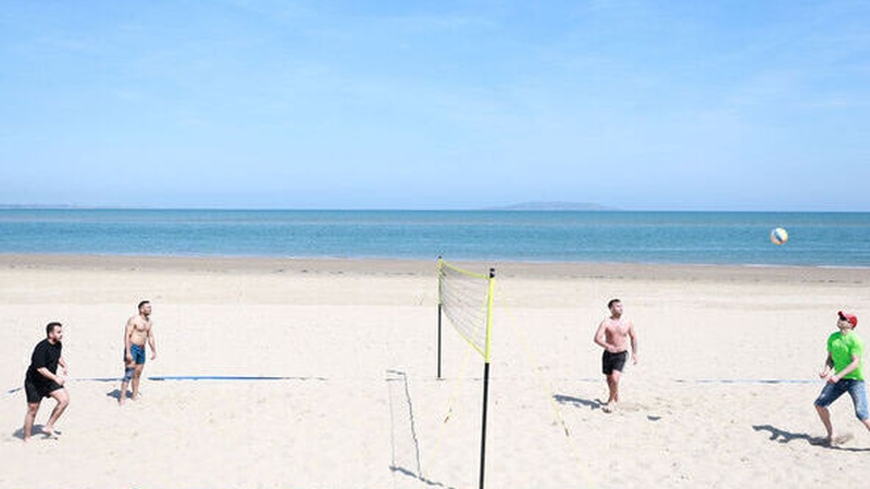 Members of the public enjoy the good weather on Burrow Beach in Dublin. Photo: Leah Farrell/RollingNews.ie