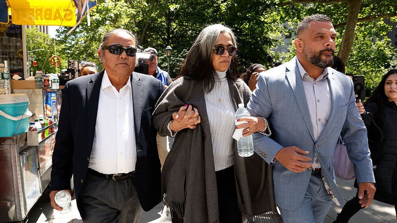 Regina Ventura, centre, and Rodrick Ventura, parents of Cassie Ventura, depart the Manhattan Federal Court