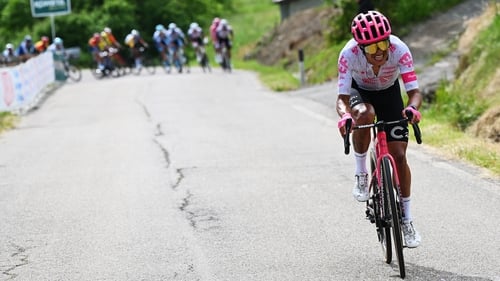 Richard Carapaz attacks in the breakaway during stage 11