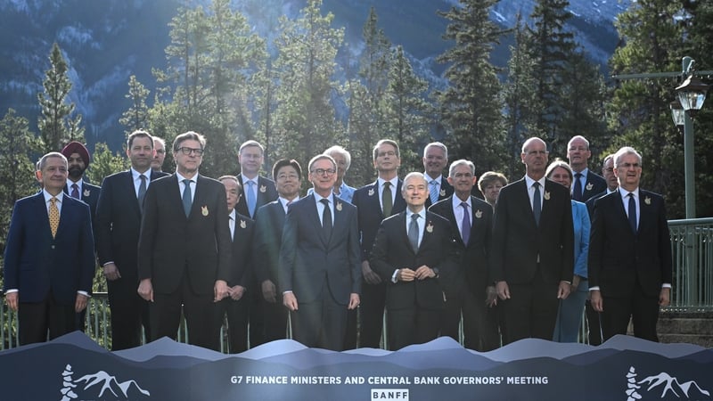 The day began with an exchange of pleasantries and the traditional group photo in front of snow-capped mountains