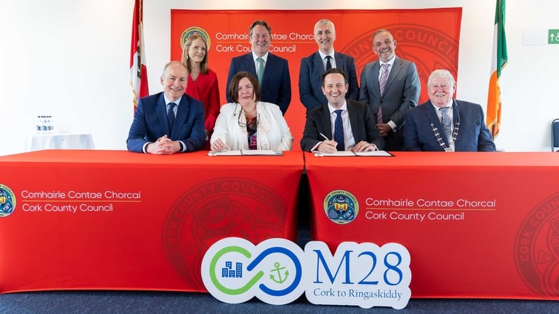 Taoiseach Micheál Martin and Minister Darragh O'Brien attended the signing ceremony in Cork