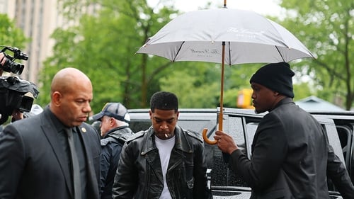 Rapper Scott "Kid Cudi" Mescudi, centre, arrives at court ahead of his testimony