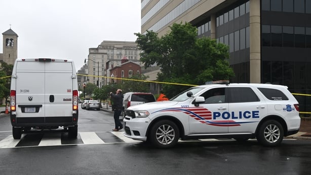 FBI agents along with Metropolitan Police at the scene