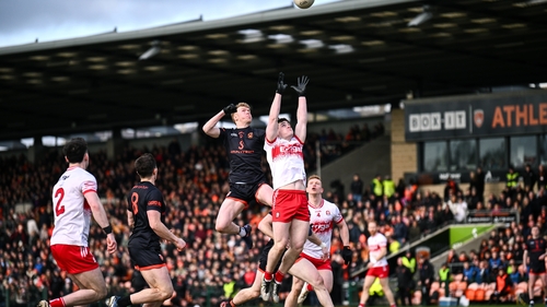 Conor Turbitt of Armagh (L) in action against Padraig McGrogan of Derry during the Allianz League clash between the sides on 23 March