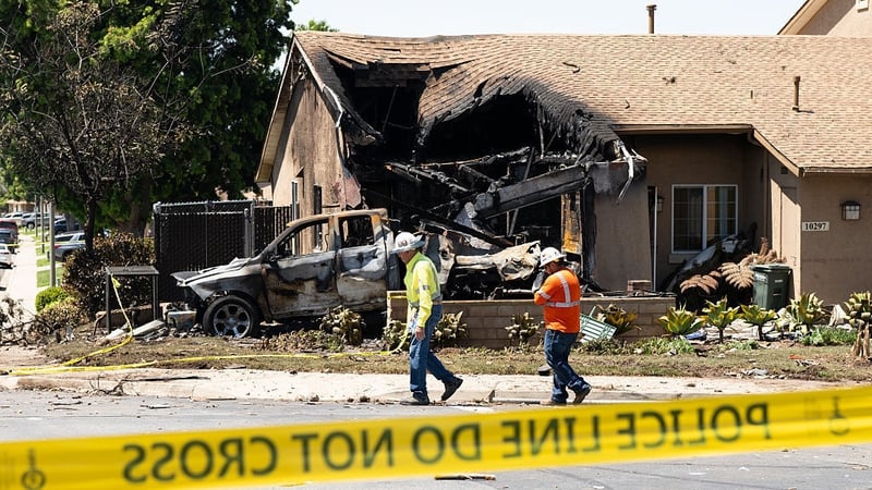 A home is partially destroyed after the small plane crashed into a San Diego neighbourhood