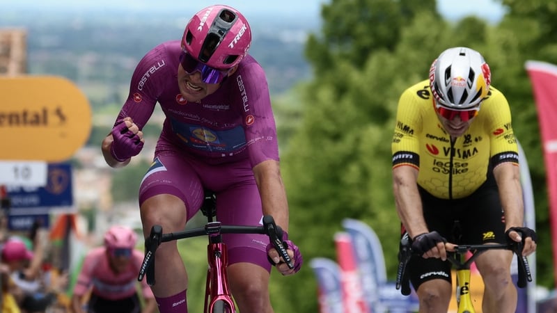 Mads Pedersen (L) celebrates after victory as he crosses the finish line