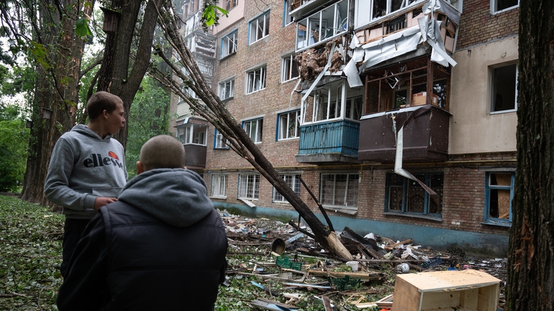 Local residents at the site of Russian drone attack on Kyiv, Ukraine