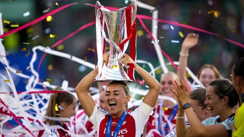 Katie McCabe with the trophy following Arsenal's victory