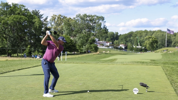 Harrington cracks his tee shot down the 18th at Congressional
