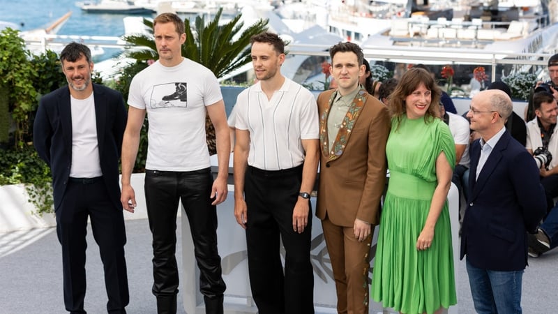 Lee Groombridge, Alexander Skarsgård, Harry Lighton, Harry Melling, Emma Norton and Ed Guiney attend the "Pillion" photocall at the 78th annual Cannes Film Festival at Palais des Festivals. Photo credit: Darren Brade
