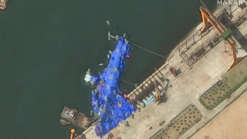 Satellite imagery shows the aftermath of the accident at the Hambuk Shipyard during the launch of a new destroyer