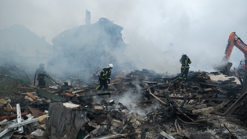Rescuers conduct a search and rescue operation in Kyiv Oblast, Ukraine