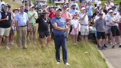 Padraig Harrington after hitting his second shot on the 18th hole