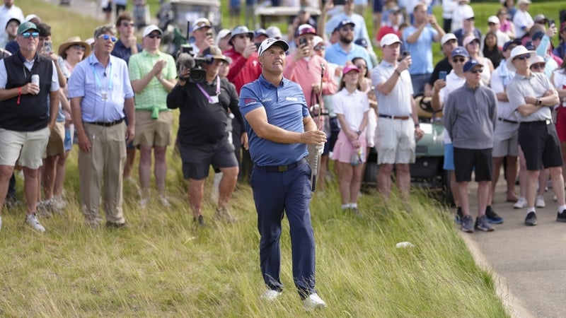 Padraig Harrington after hitting his second shot on the 18th hole