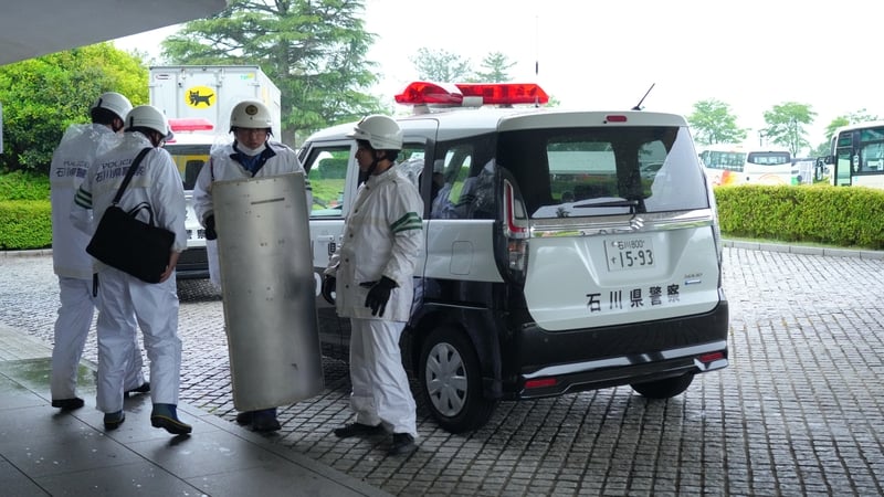 Police officers at the scene in Komatsu in Japan