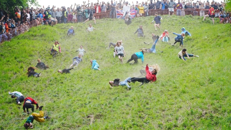 Participants threw themselves down Cooper's Hill in Brockworth in pursuit of the wheel of cheese