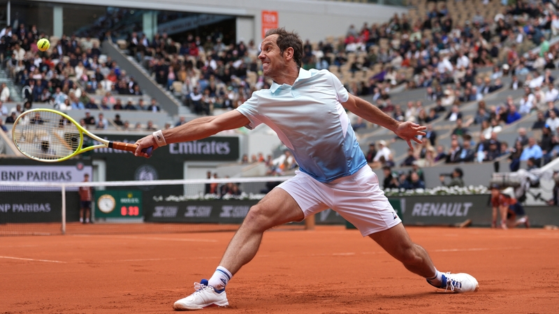 Richard Gasquet plays a backhand return