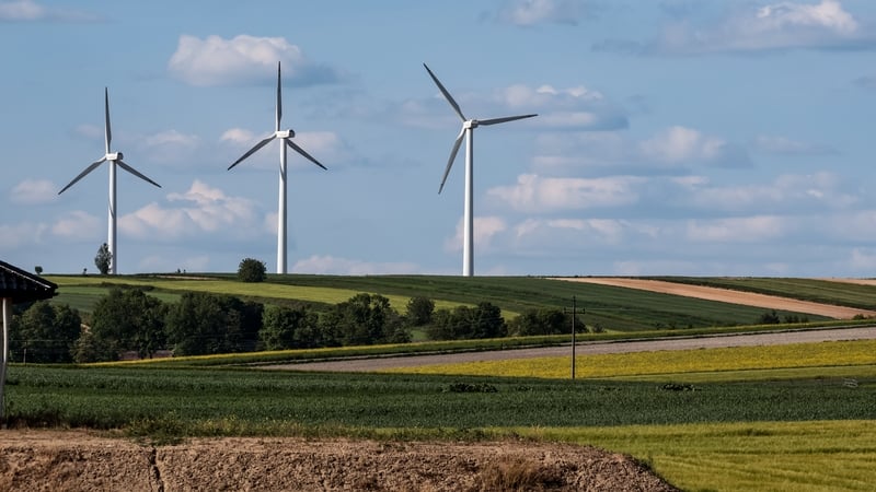 Wind turbines are seen near Miechow in Poland - one of the countries which has not submitted its energy and climate plans
