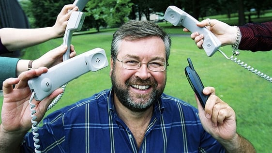 Broadcaster Joe Duffy posing with telephone handsets to publicise his RTÉ Radio 1 show 'Liveline' i…