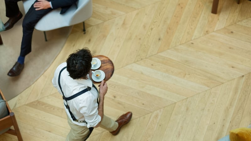 'When we experience poor customer service on holidays, we tend to blame that individual for ruining our experience rather than considering their working conditions'. Photo: Getty Images