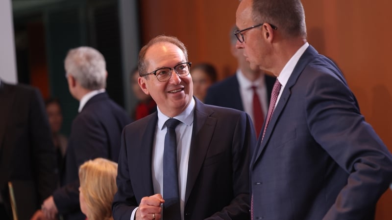 German Chancellor Friedrich Merz (R) and Interior Minister Alexander Dobrindt at the weekly German government cabinet meeting