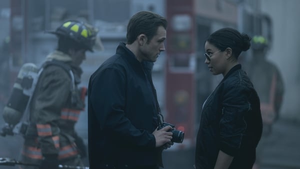 Taron Egerton as Dave Gudsen and Jurnee Smollett as Michelle Calderone in Smoke